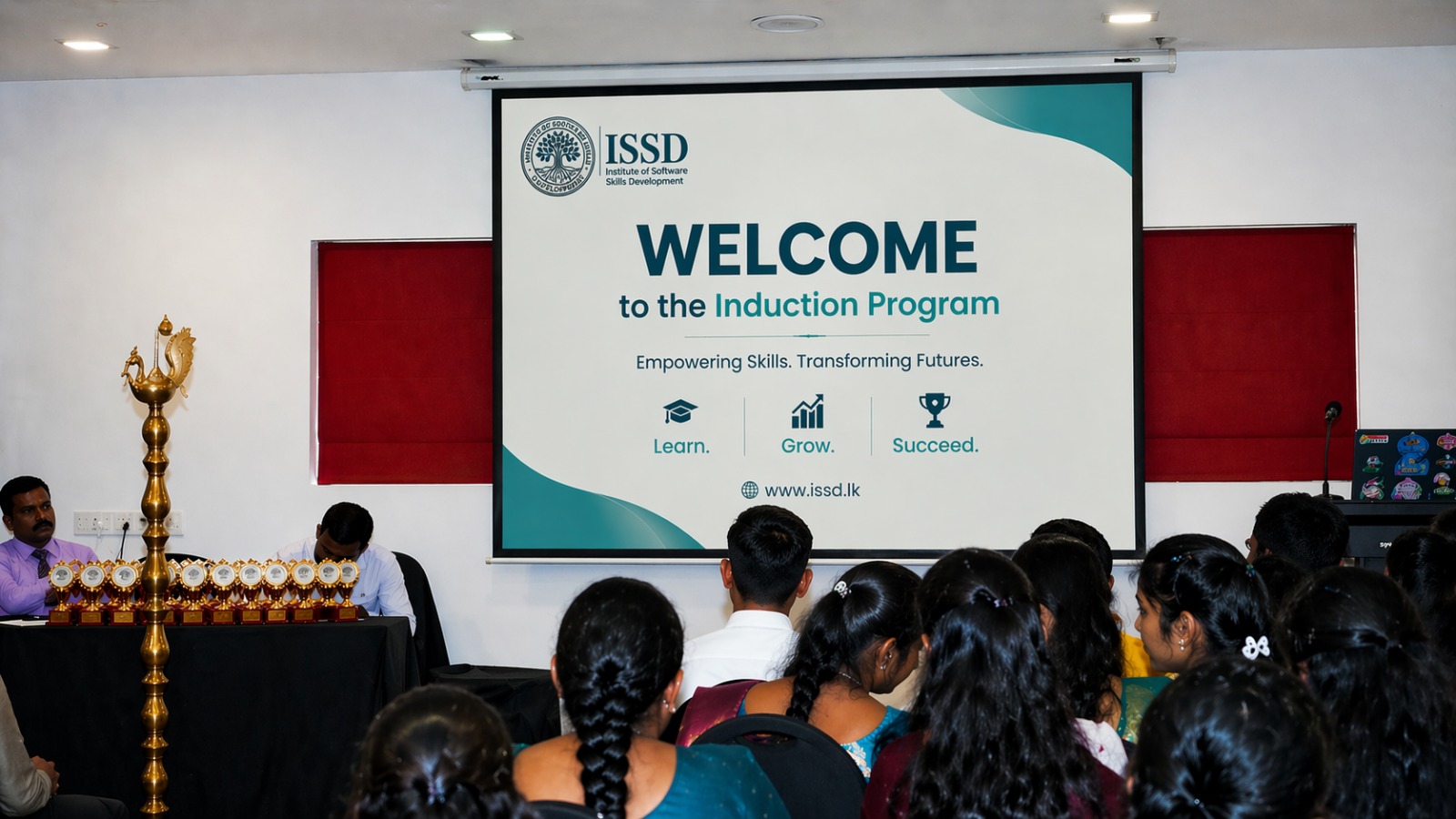 Students learning IT skills in a modern classroom